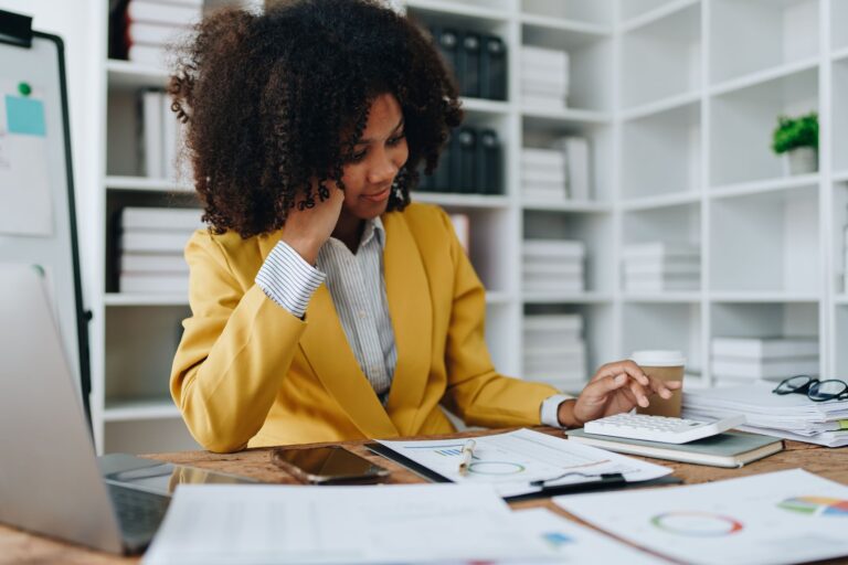 Bookkeeper looking over accounting documents